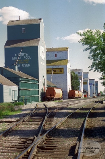 Photograph of wooden grain elevators at High River, Alberta Photograph of wooden grain elevators at High River, Alberta