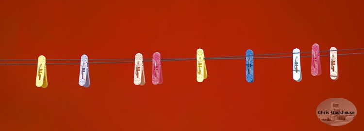 Cloths pegs relaxing in the sun