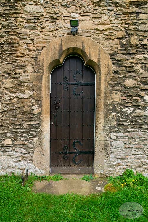 Photo of side door at St Mary the Virgin Church, Bampton, Oxfordshire, UK. Photo of side door at St Mary the Virgin Church, Bampton, Oxfordshire, UK.